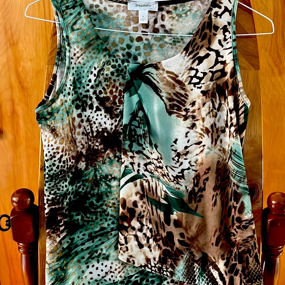 Sleeveless silky top size small. Beautiful teal, brown & cream colors.
